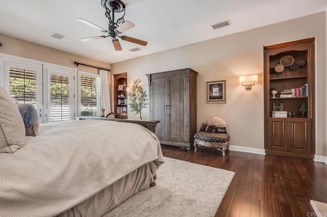 bedroom with dark wood-type flooring, access to exterior, and ceiling fan