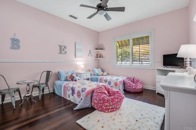 bedroom with dark wood-type flooring and ceiling fan