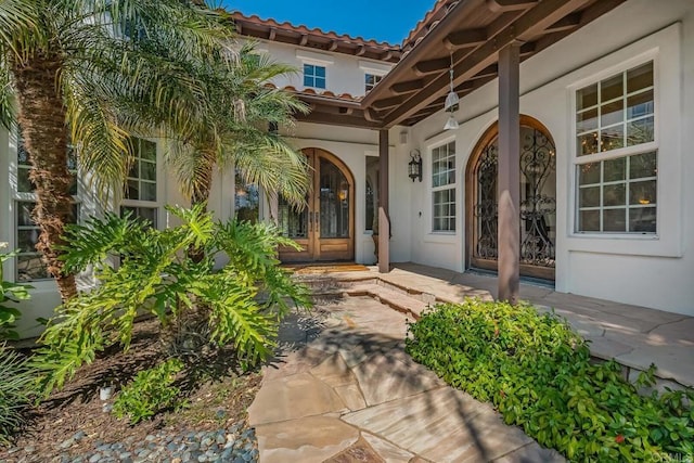 doorway to property featuring french doors