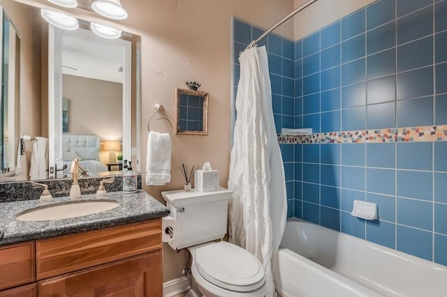 full bathroom featuring vanity, toilet, and shower / bath combo with shower curtain