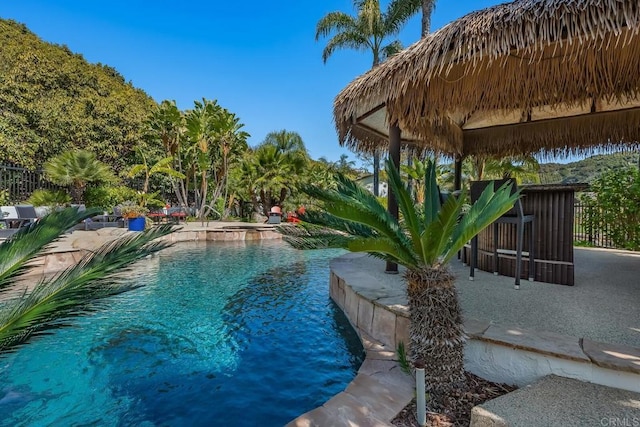 view of swimming pool featuring a gazebo