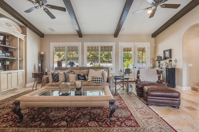 living room featuring beamed ceiling, ceiling fan, and french doors