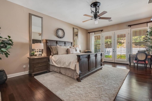 bedroom with dark wood-type flooring, ceiling fan, access to exterior, and french doors