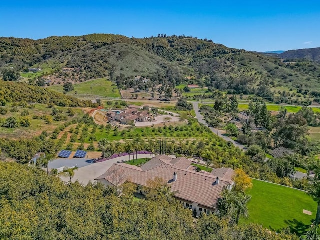 drone / aerial view featuring a mountain view