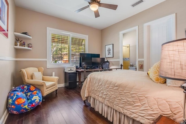 bedroom featuring dark hardwood / wood-style flooring and ceiling fan