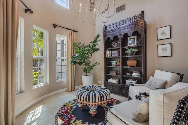 living area with a chandelier