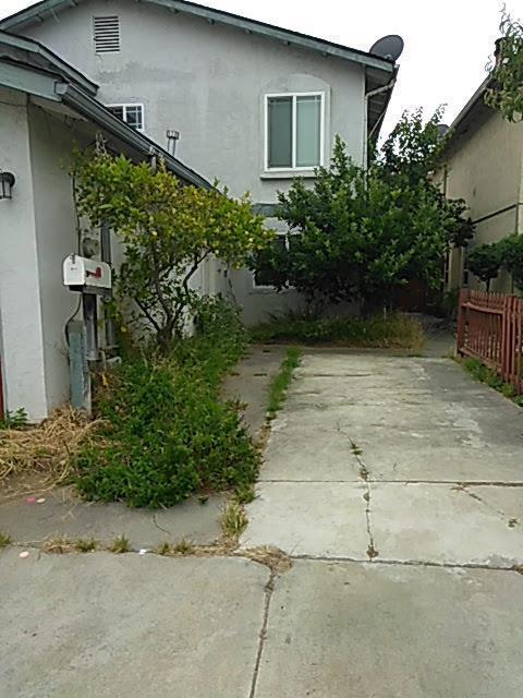 view of side of home featuring a patio