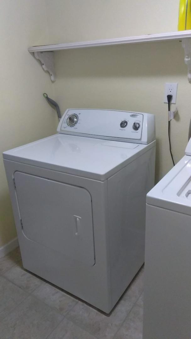 laundry room with washer and dryer