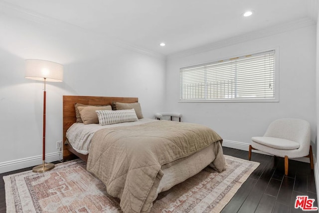 bedroom featuring crown molding and hardwood / wood-style floors