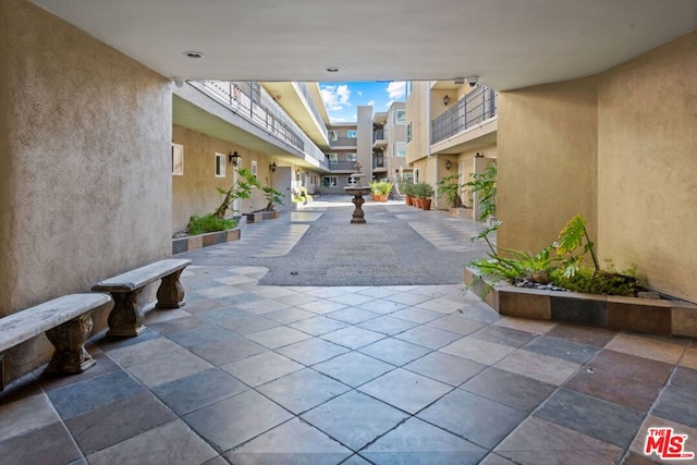 view of community with a patio area