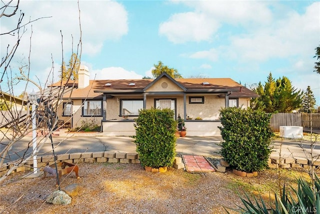 view of front of property featuring a patio