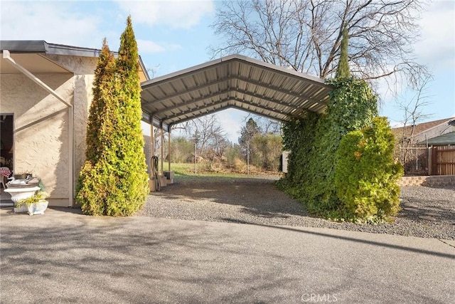 view of car parking with a carport