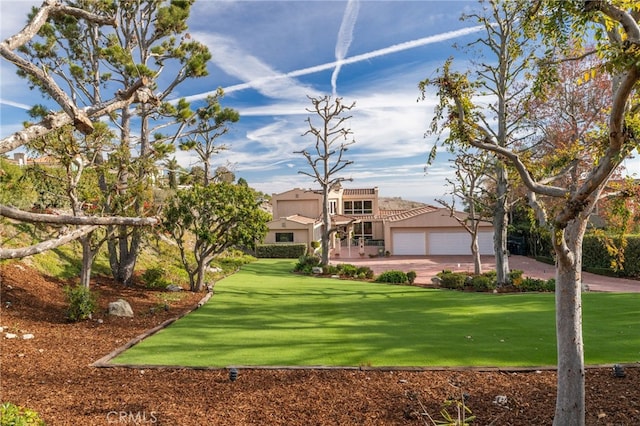 view of yard featuring a garage