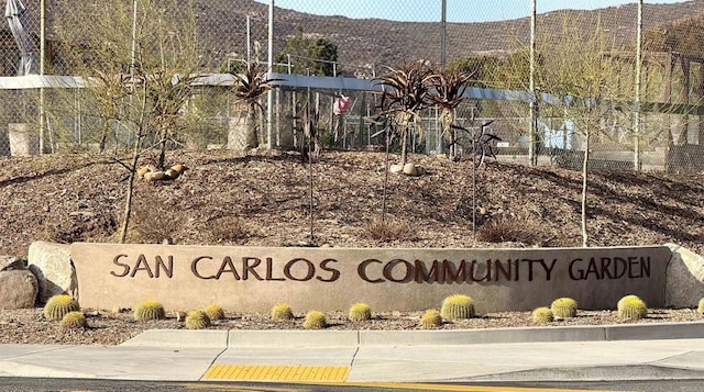 community sign featuring a mountain view