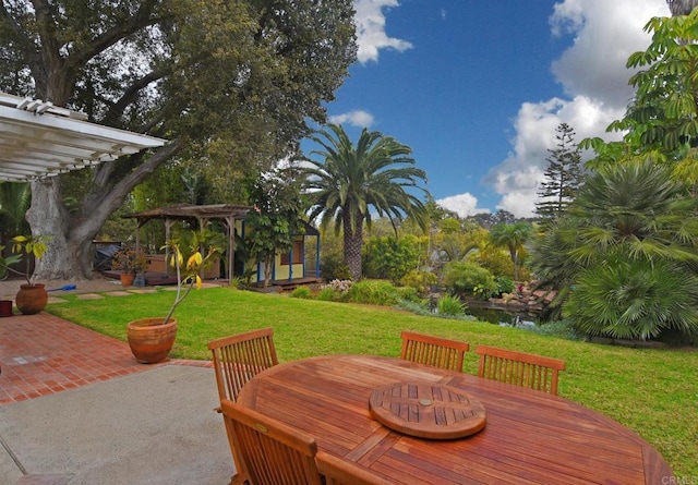 view of patio / terrace featuring an outdoor structure