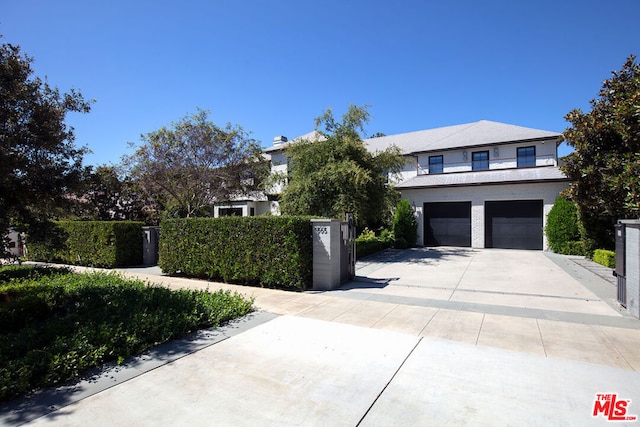 view of front of property featuring a garage