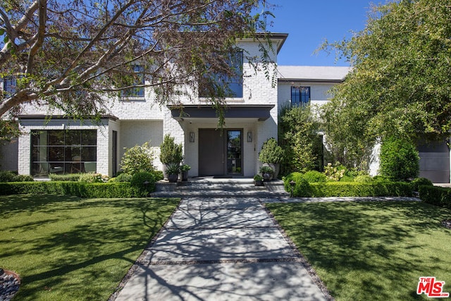 view of front of house with a front yard