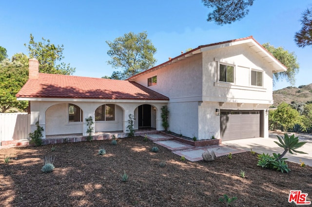 view of front of home featuring a garage