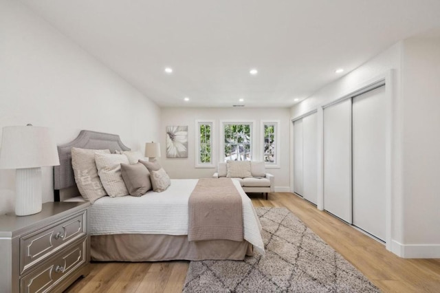 bedroom with light wood-type flooring