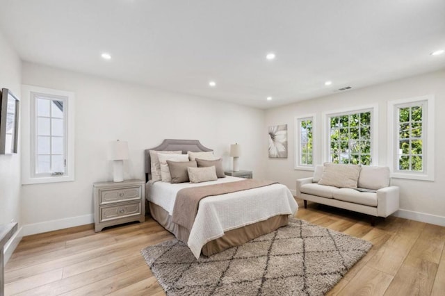 bedroom featuring light hardwood / wood-style floors