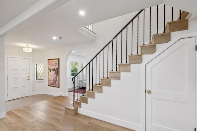 entryway with light hardwood / wood-style floors