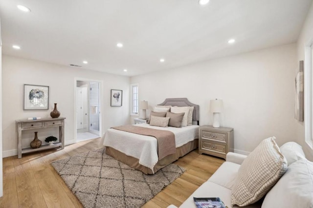 bedroom featuring light hardwood / wood-style floors