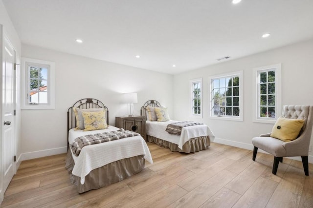 bedroom with light wood-type flooring