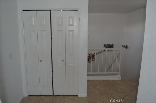 interior space featuring light tile patterned flooring