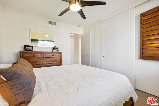 bedroom featuring ceiling fan and carpet flooring