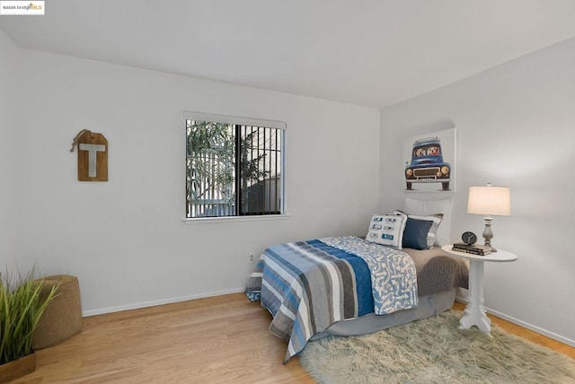 bedroom featuring hardwood / wood-style flooring