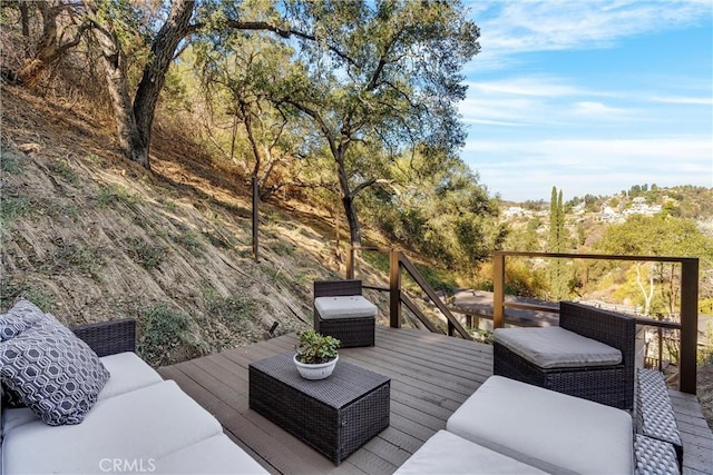 deck with an outdoor hangout area