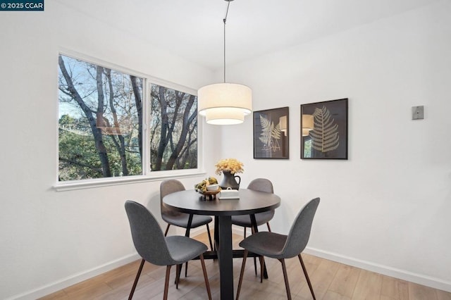 dining room featuring light hardwood / wood-style floors