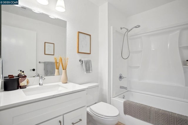 full bathroom with shower / washtub combination, vanity, and toilet