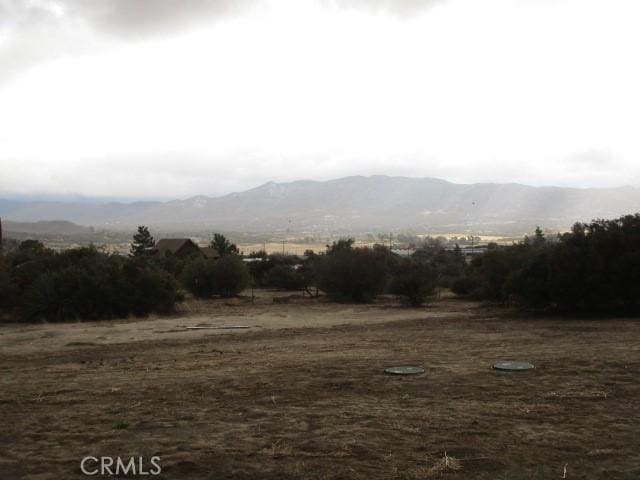 property view of mountains with a rural view