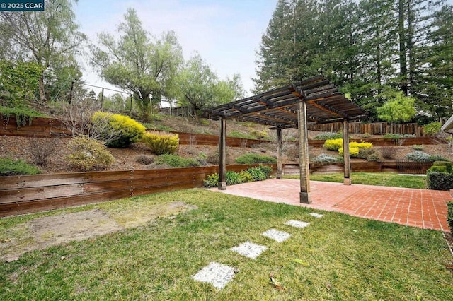 view of yard featuring a pergola and a patio area