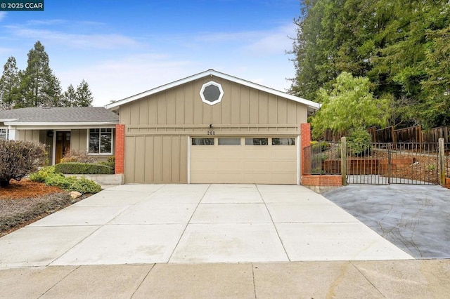 ranch-style house featuring a garage