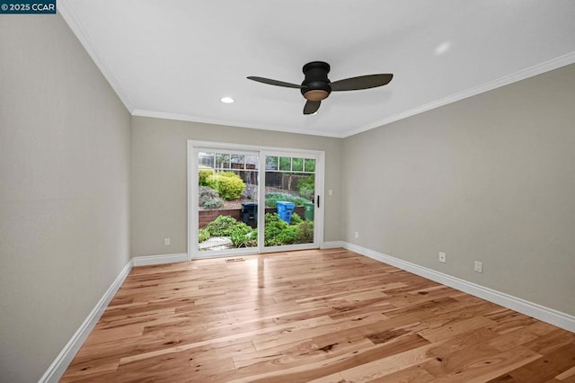 unfurnished room featuring ornamental molding, ceiling fan, and light hardwood / wood-style flooring