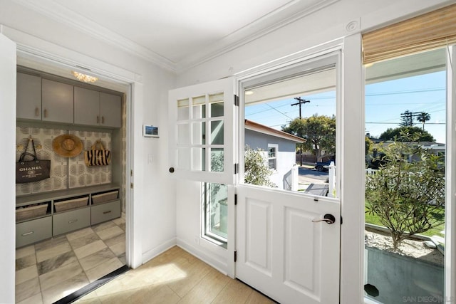 entryway with crown molding