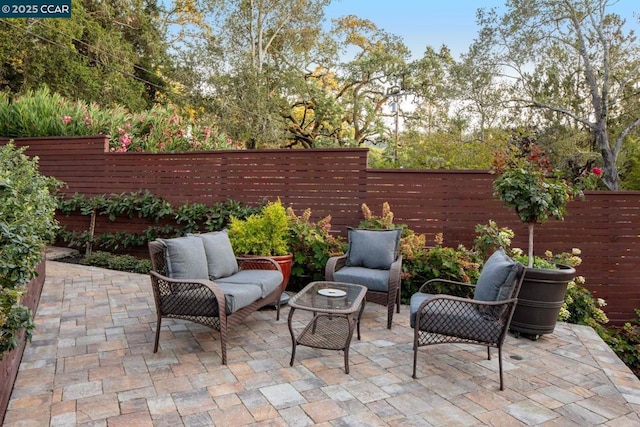 view of patio / terrace with an outdoor hangout area