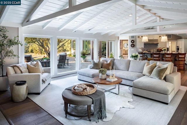 sunroom with lofted ceiling with beams