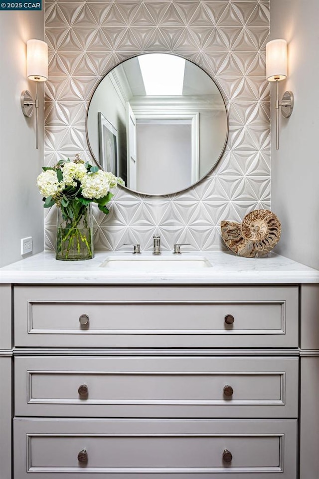 room details with vanity and decorative backsplash