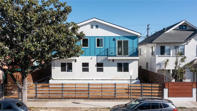 236 N Burlington, Los Angeles, CA 90026 - view of front of house featuring stucco siding, stairs, and board and batten siding