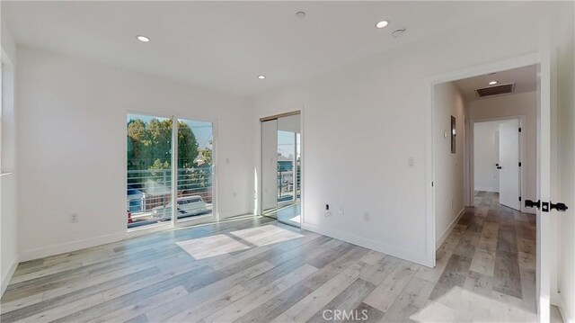 236 N Burlington, Los Angeles, CA 90026 - unfurnished room featuring light wood-type flooring and recessed lighting