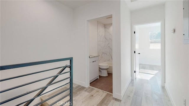 236 N Burlington, Los Angeles, CA 90026 - hallway featuring an upstairs landing and light wood-style floors