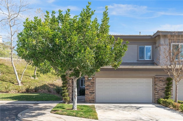 view of front of property featuring a garage