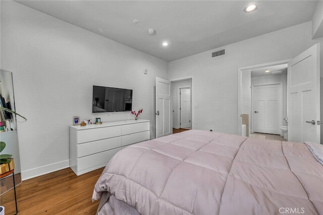 bedroom featuring light hardwood / wood-style floors