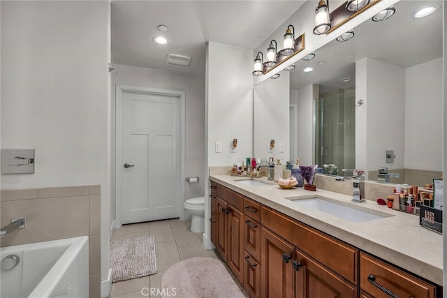 full bathroom with tile patterned floors, toilet, independent shower and bath, and vanity