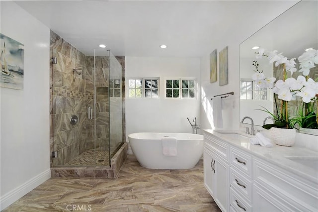 bathroom featuring vanity and plus walk in shower