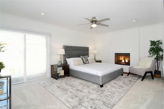 bedroom featuring carpet floors, crown molding, access to outside, and ceiling fan