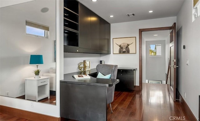 kitchen with dark wood finished floors, open shelves, dark countertops, visible vents, and modern cabinets